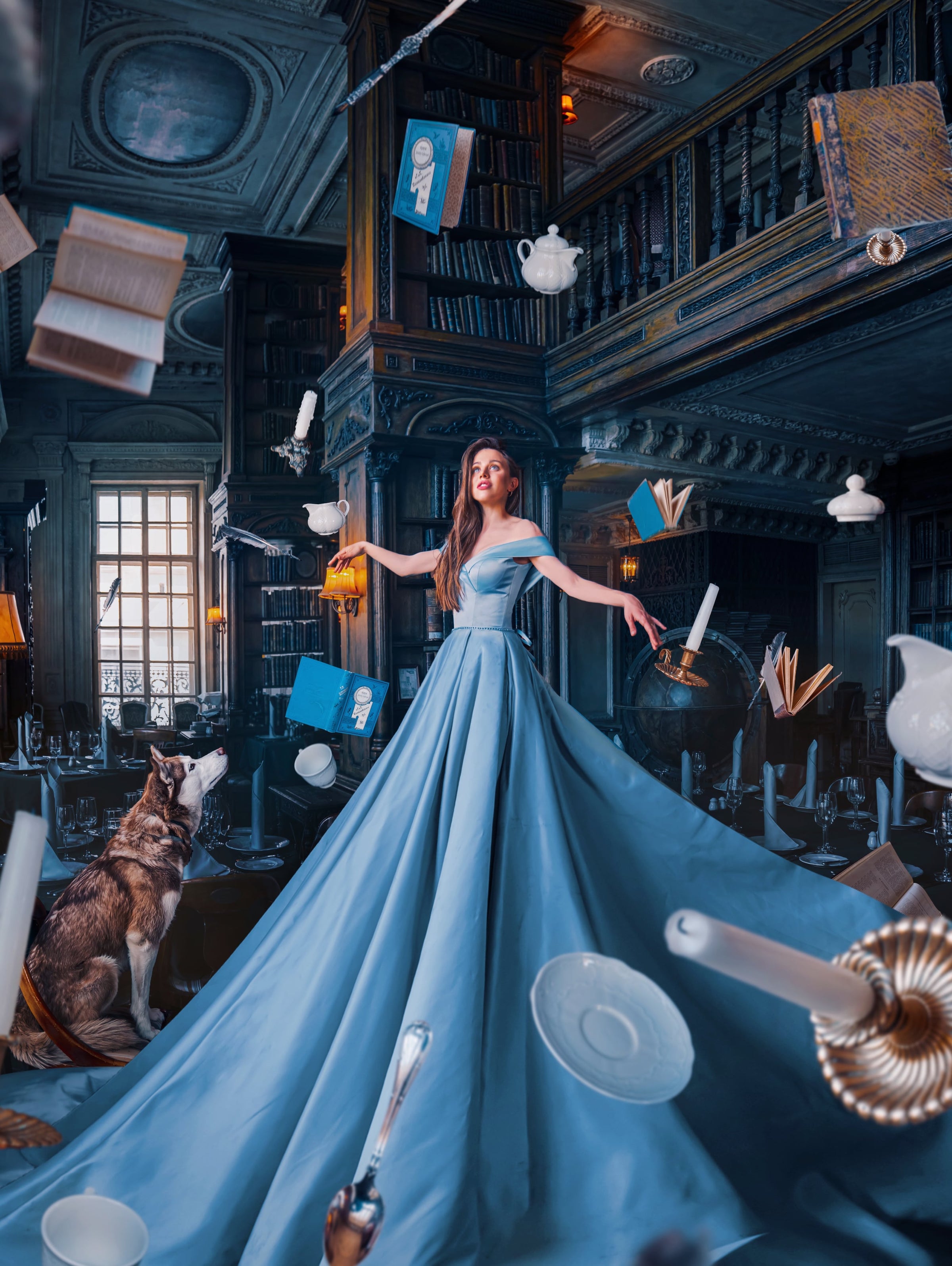 Photographie artistique montrant une princesse en robe bleue entourée d'une ambiance fantastique