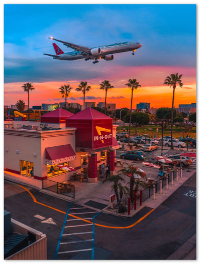 Tableau photo d'art en plexiglas montrant un fast food, un avion et l'effervescence de Los Angeles